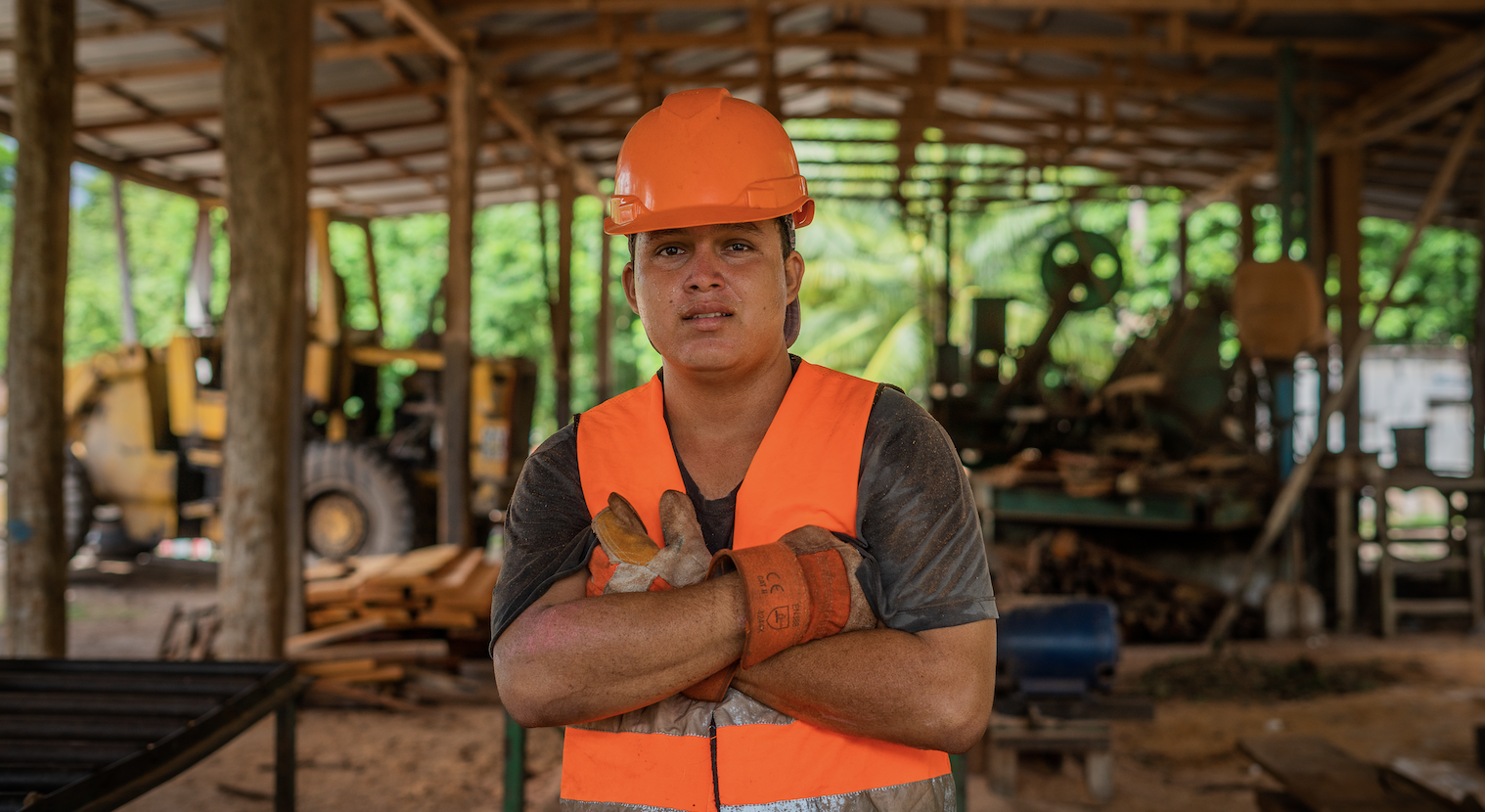worker in forest concession in Guatemala portrait in workshop